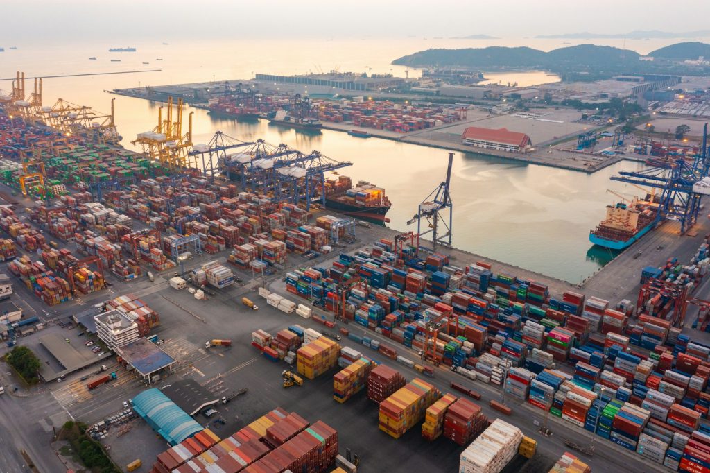 Aerial top view of container cargo ship in the export and import business and logistics