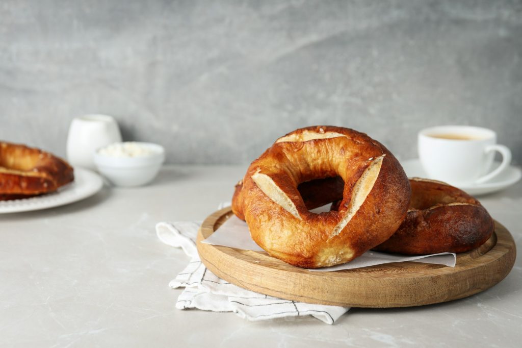 Concept of tasty food - bagel, tasty bakery products